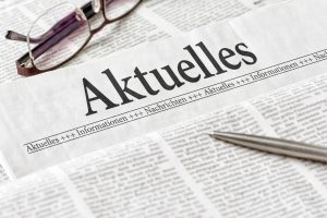 Zeitung mit der Überschrift Aktuelles